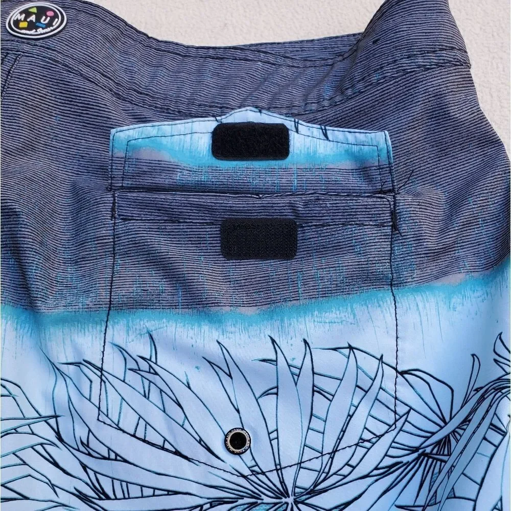 Maui and Sons blue gray and black board shorts